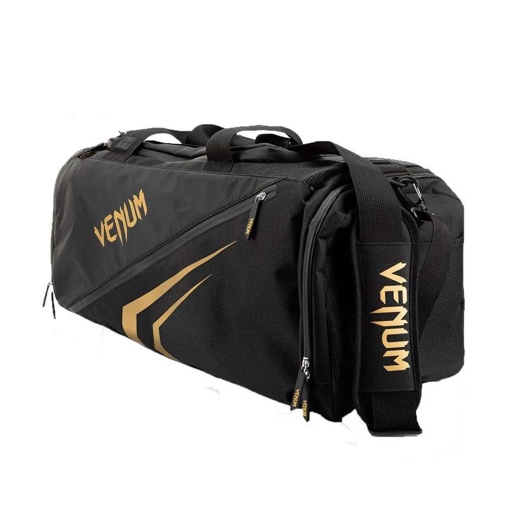 Venum Trainer Lite EVO Sports Bags – Black/Gold 1 Venum Trainer Lite EVO Sports Bags – Black/Gold